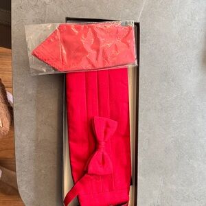 Red cummerbund and bow tie great for prom